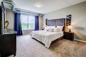 Pittsburgh apartment for rent - a bedroom with a bed and a window