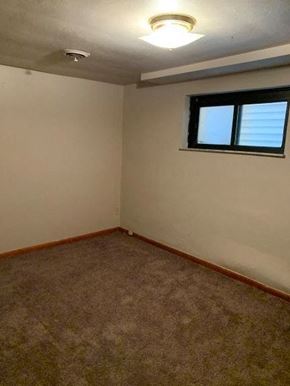 East Mckeesport apartment for rent - an empty room with a window and a carpet
