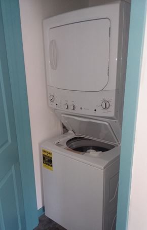 Saint Paul apartment for rent - a washer and dryer in a room with a door