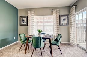 Upper St Clair apartment for rent - a dining room with a table and chairs and a window