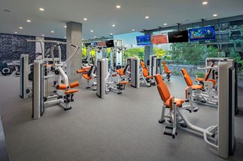 Indoor & outdoor fitness center with cardio, strength training, free weights, stretching, yoga & outdoor fitness area