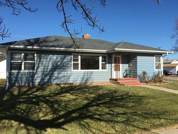Kearney apartment for rent - a blue house with a lawn and a tree