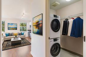 Seattle apartment for rent - a living room with a washing machine and a washer and dryer