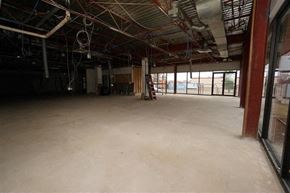 Fort Saskatchewan apartment for rent - an empty room with a ladder in the middle of it