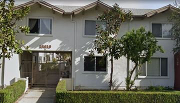Los Angeles apartment for rent - A white house with the number 18619 on the front.