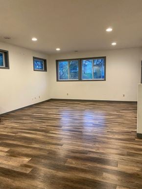 Saint Paul apartment for rent - a living room with wood floors and white walls and windows