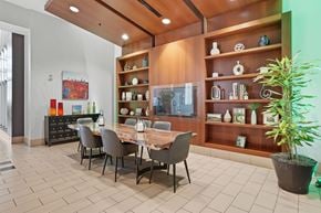 Charlotte apartment for rent - A dining room with a table set for six.