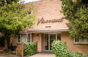 Denver apartment for rent - A brick building with a sign that says "Vesount" on it.