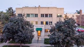 Denver apartment for rent - A building with a green awning that says Bermuda.