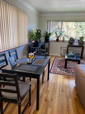 Denver apartment for rent - a dining room with a table and chairs