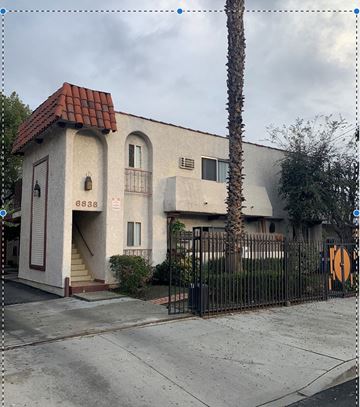 North Hollywood apartment for rent - a house with a gate and a palm tree