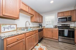 Newport News apartment for rent - Kitchen with stainless steel appliances at Villages at City Center apartments in Newport News VA