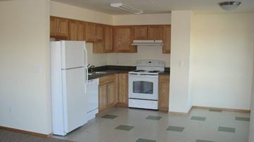 Seattle apartment for rent - a kitchen with a stove and a refrigerator