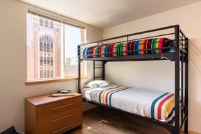 Seattle apartment for rent - A bedroom with a bunk bed and a dresser.