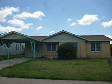 Snyder house for rent - the front of a house with a covered porch