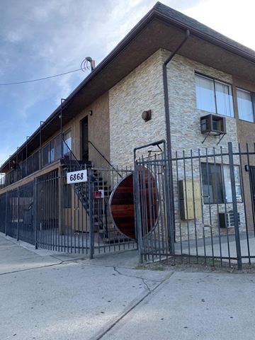 North Hollywood apartment for rent - a building with a gate in front of it