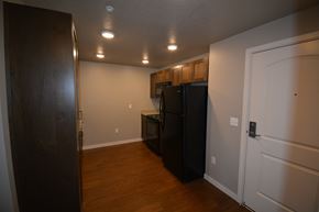 Eagle apartment for rent - Image of a refrigerator, a stove, a microwave and some cabinets