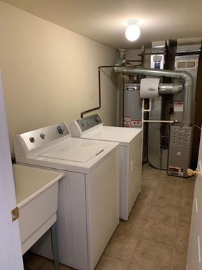 Chesterfield house for rent - a laundry room with two washes and a dryer