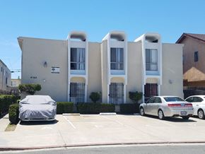 San Diego apartment for rent - A car is parked in front of a building with a sign that reads 4160.