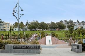 San Francisco apartment for rent - a park with a fountain and a sign