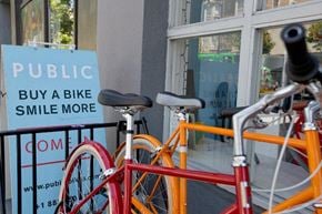 San Francisco apartment for rent - a bike parked on a fence next to a sign