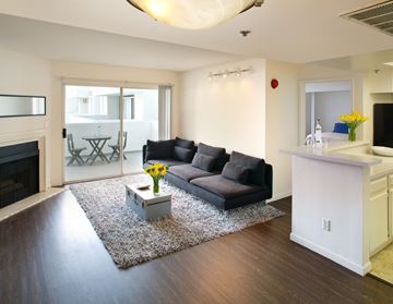 Los Angeles apartment for rent - a living room with a couch and a table
