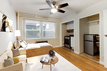 Denver apartment for rent - a living room with a couch and a ceiling fan