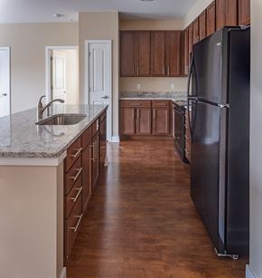 Abingdon apartment for rent - a kitchen with black appliances and granite counter tops
