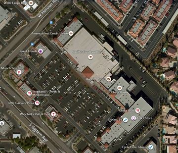 Las Vegas apartment for rent - An aerial view of a shopping area with stores like Jewel Trends and AT&T Store.