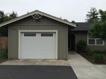 Sonoma apartment for rent - a garage with a white door in front of a house