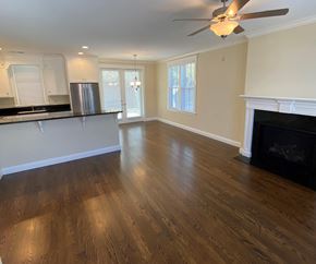Sonoma house for rent - A living room with a fireplace and wood flooring.