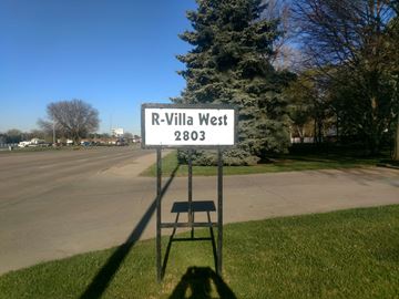 Kearney apartment for rent - a street sign sitting on the side of a road