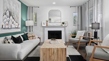 Renton apartment for rent - A living room with a fireplace and a painting on the wall.