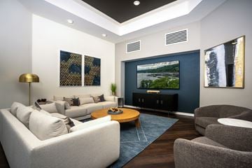 West Linn apartment for rent - A living room with a white couch and a wooden coffee table.