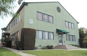 Wilmington apartment for rent - a building with a green facade and a green awning