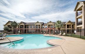 Orange apartment for rent - the preserve at ballantyne commons pool and apartment buildings