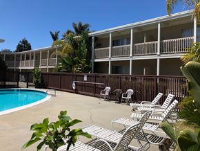 Santa Cruz apartment for rent - the pool and patio of a hotel with chairs and a swimming pool