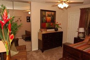 Westminster apartment for rent - A bedroom with a bed, dresser, and a painting on the wall.