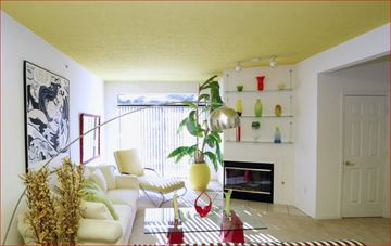 Indianapolis apartment for rent - a living room with a white couch and a fireplace