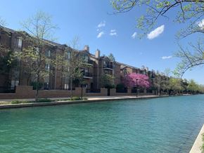 Indianapolis apartment for rent - an apartment building on the side of a river