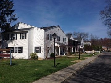 Fishkill apartment for rent - a row of white houses on the side of a street