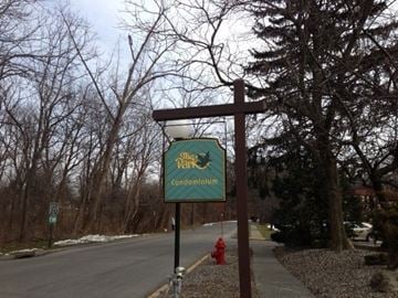 Fishkill apartment for rent - A sign for The Park condominium is displayed on a post.