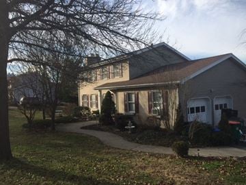 Wappingers Falls house for rent - A house with a tree in front of it.