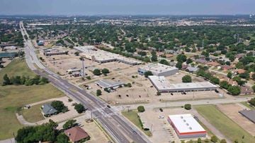 Hurst apartment for rent - an aerial view of a city with highways and buildings