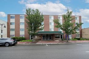 Zion apartment for rent - A building with a green awning and a sign that says "Courtyard by Marriott".