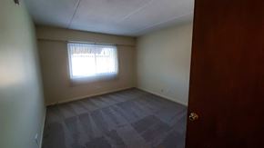 Zion apartment for rent - A room with a window and a door.