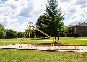 Grand Rapids apartment for rent - Play Park with slides, swings, and more at Cambridge Square in Grand Rapids