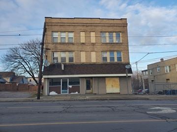 Youngstown apartment for rent - an old brick building on the corner of a street