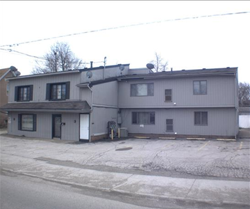 Warren apartment for rent - a large building with a street in front of it