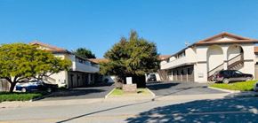 Arroyo Grande apartment for rent - A residential street with houses on both sides and cars parked on the side.
